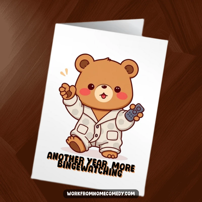 Funny Free Printable Birthday Card: Brown bear in pajamas excitedly points a TV remote, signaling a command for a fun celebration.